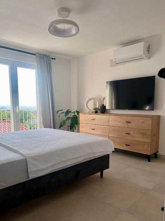 Apartment No2 – Penthouse mit Meerblick, Wohnbereich und Terrasse